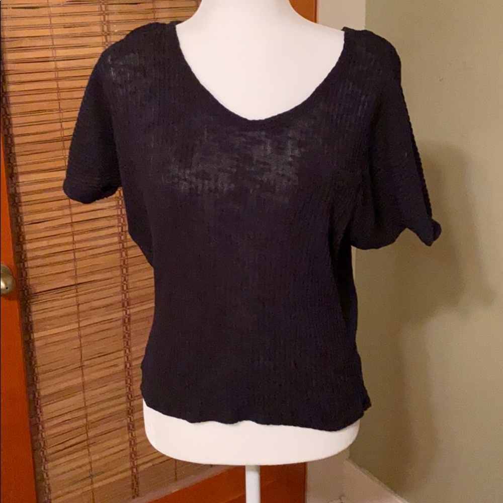 Black sheer woven top with front pocket